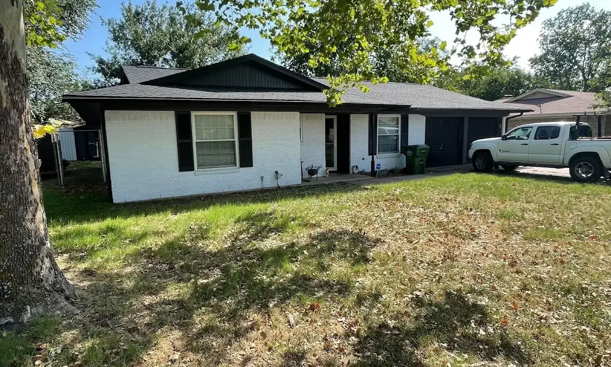 Professional roofing crew working on a residential roof in Steubenville